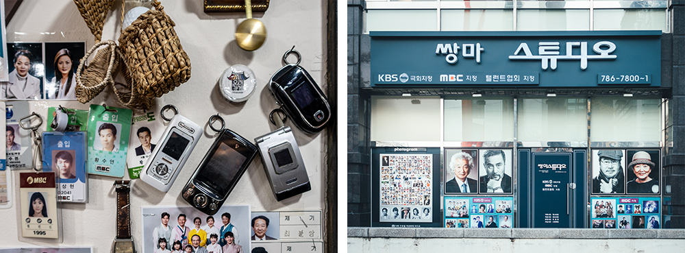 A picture of an old entrance pass next to a display of old mobile phones with another picture showing the studio interior with various photos of different couples