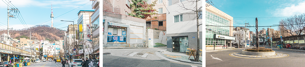 Left picture: A mainstreet with a market off to the left and the N Seoul Tower resting at the mountaintop off in the distance; middle picture: A winding corner where three sidestreets meet showing a convenience store closed during off hours; right picture: A rotary during the day with a skinny, tall structure in the middle