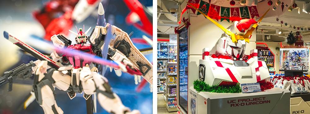 Left picture: A close-up of a white gundam holding a pink sword and black gun with torquoise eyes; Right picture: A huge display of a gundam from the shoulders up located at the front of the store